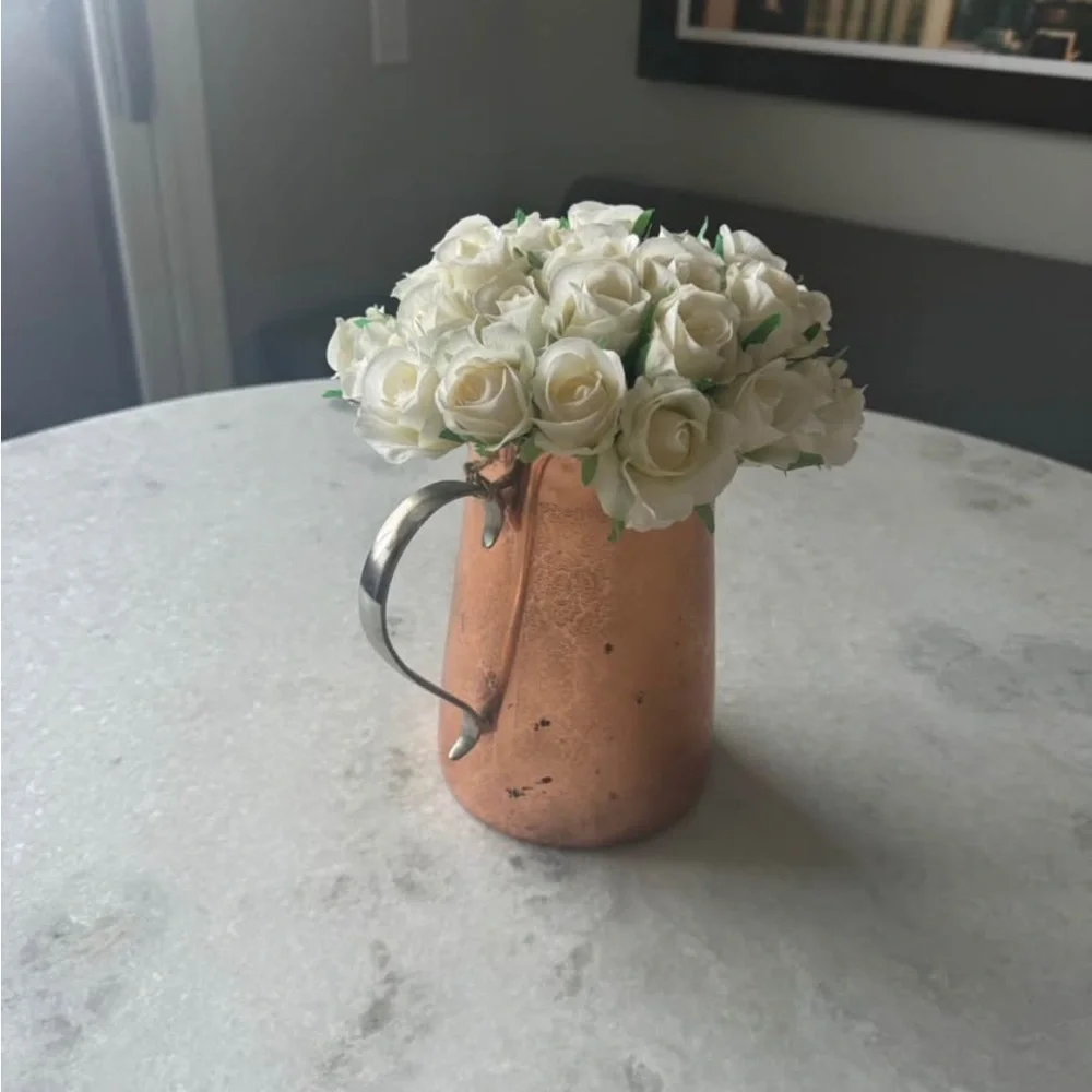 Elegant Copper Vase with White Roses
